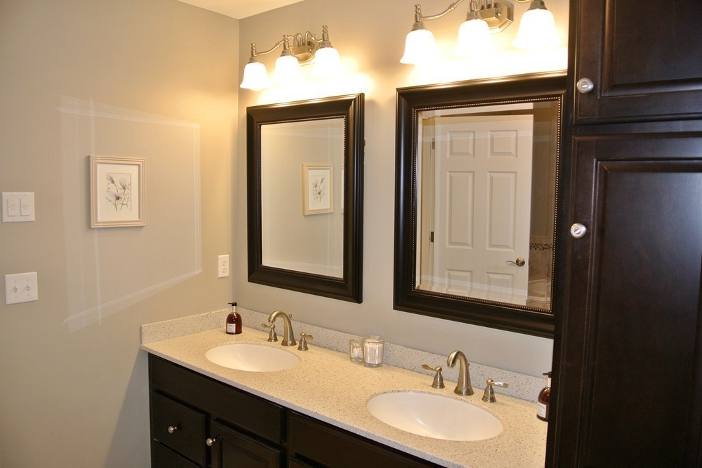92 Robin Hill Road Groton, MA 01450 - Photo 23 of 30 a bathroom with 2 sink and a mirror