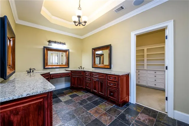 a bathroom with a tub and a sink