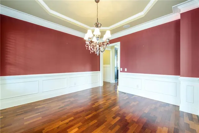 a view of a livingroom with wooden floor