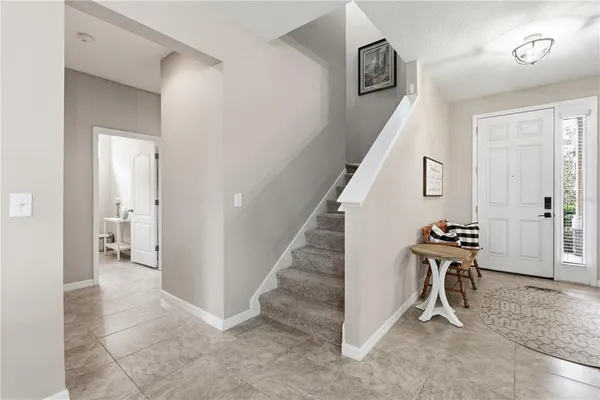 a view of a hallway with front door