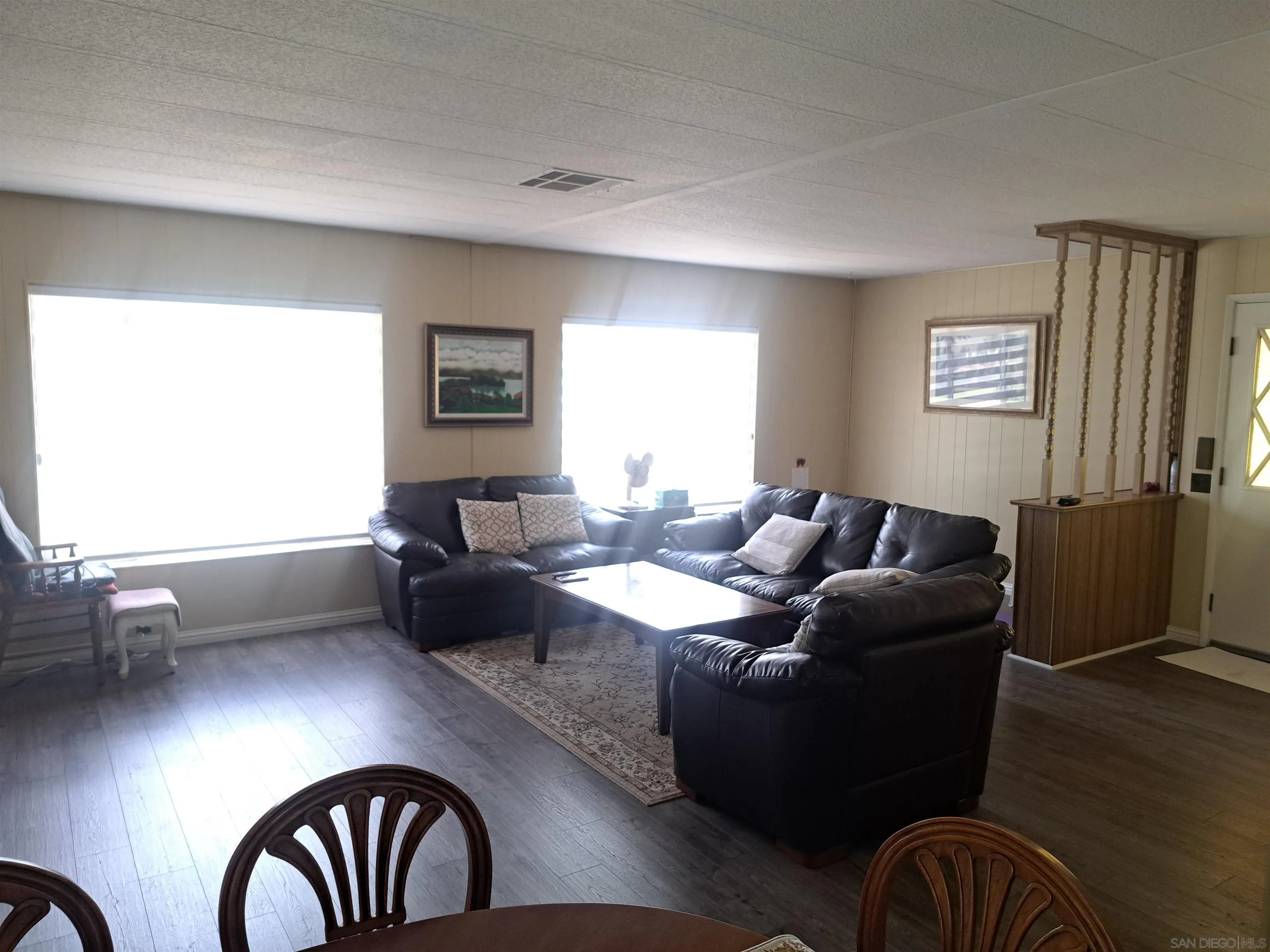 4650 Dulin Road, Unit 12 Fallbrook, CA 92003 - Photo 11 of 36 a living room with furniture and wooden floor