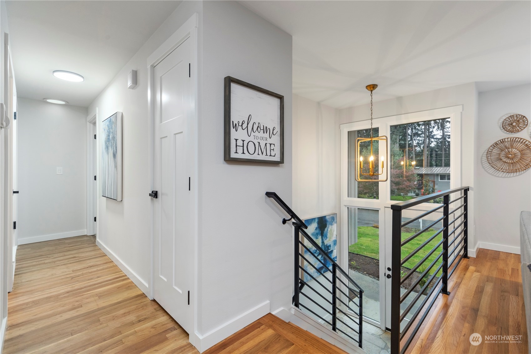 107 234th Place Southeast Bothell, WA 98021 - Photo 3 of 37 a view of a hallway with workspace