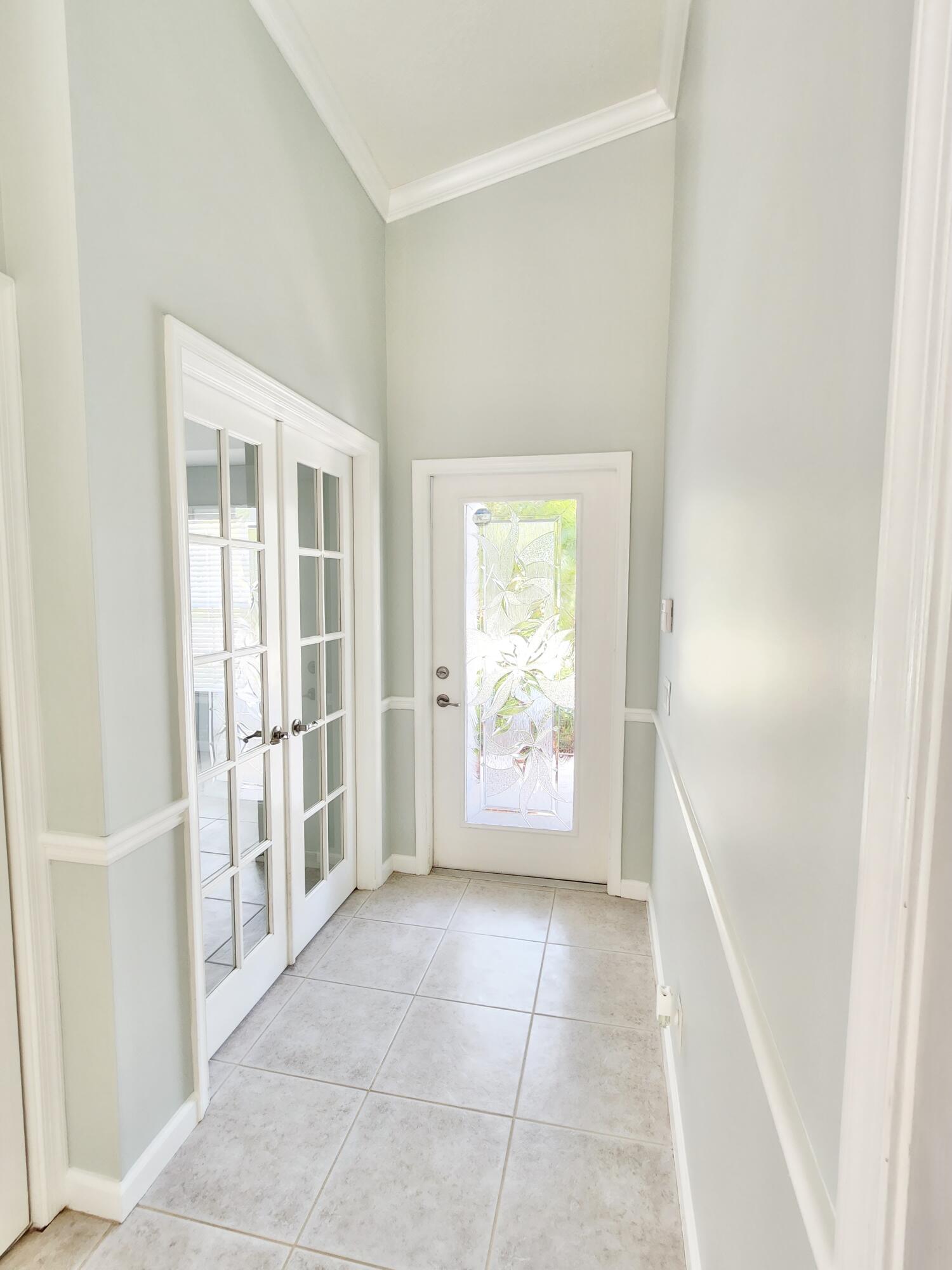 2464 Southwest Omega Way Stuart, FL 34997 - Photo 5 of 70 Front door