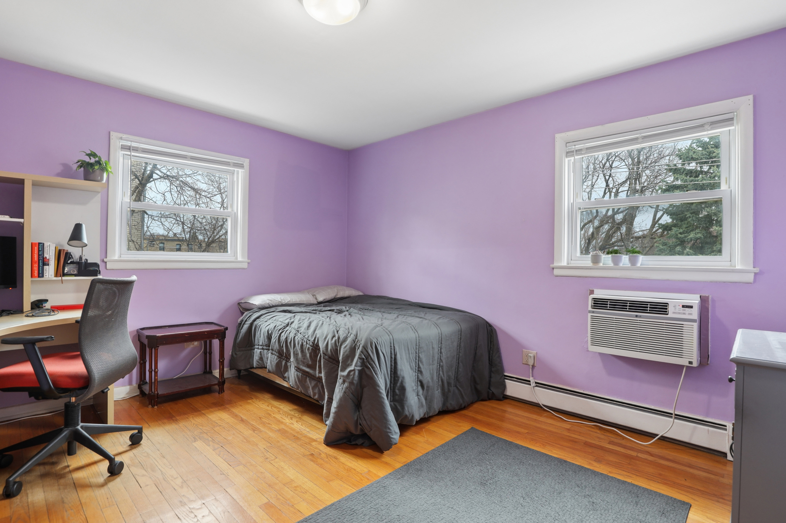 2147 Ridge Avenue, Unit 2D Evanston, IL 60201 - Photo 12 of 22 a living room with furniture and a window