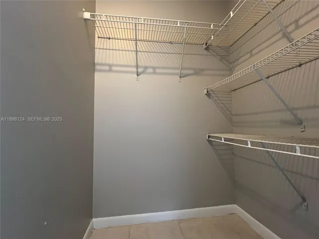 a view of a room with racks on the wall