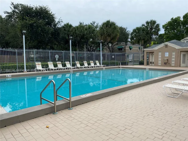 a view of a chair and tables on the terrace