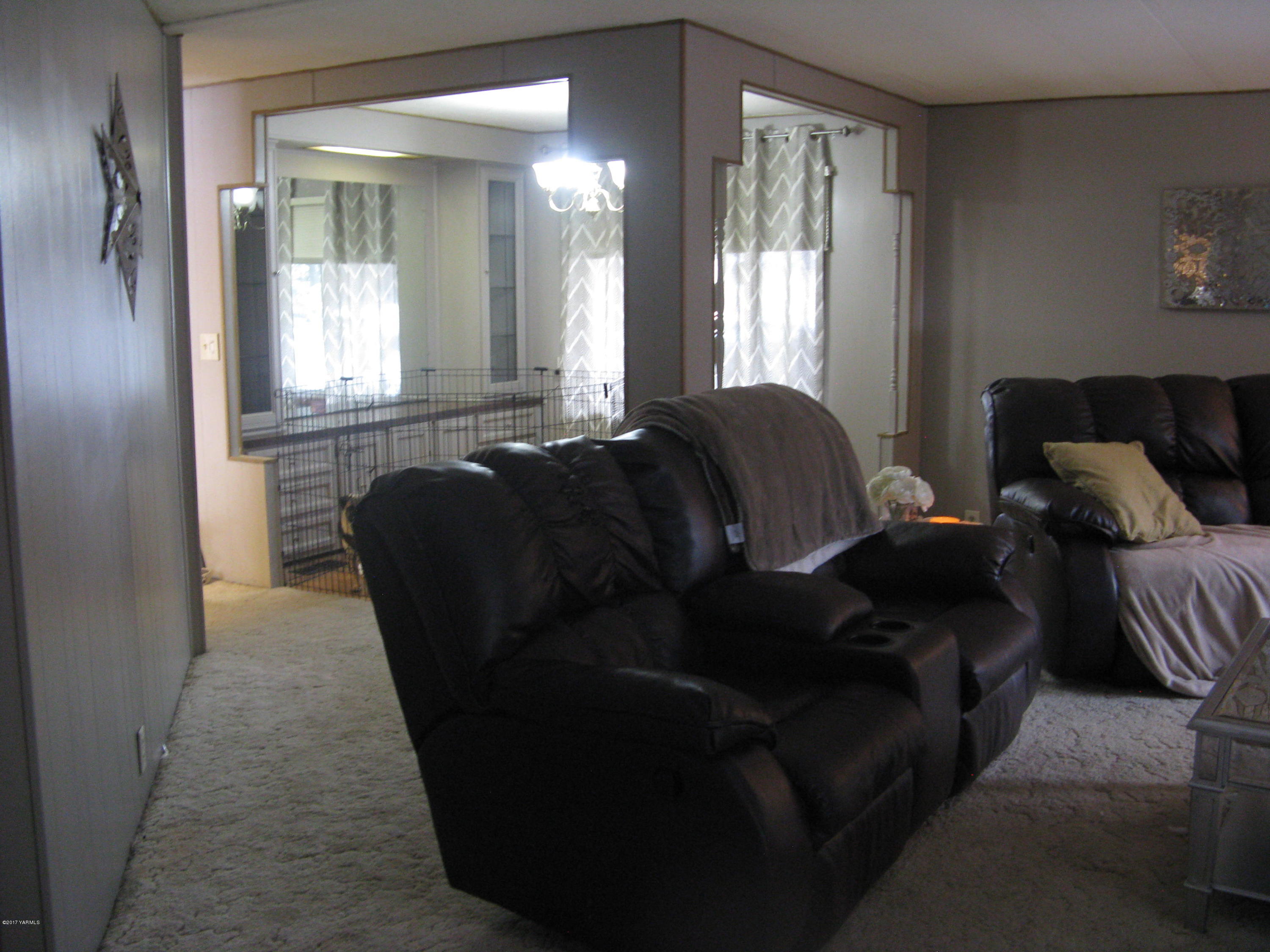 3103 Wiley Road Yakima, WA 98903 - Photo 9 of 42 a living room with furniture and a large window