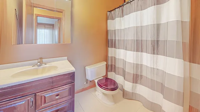 a bathroom with a sink and a toilet