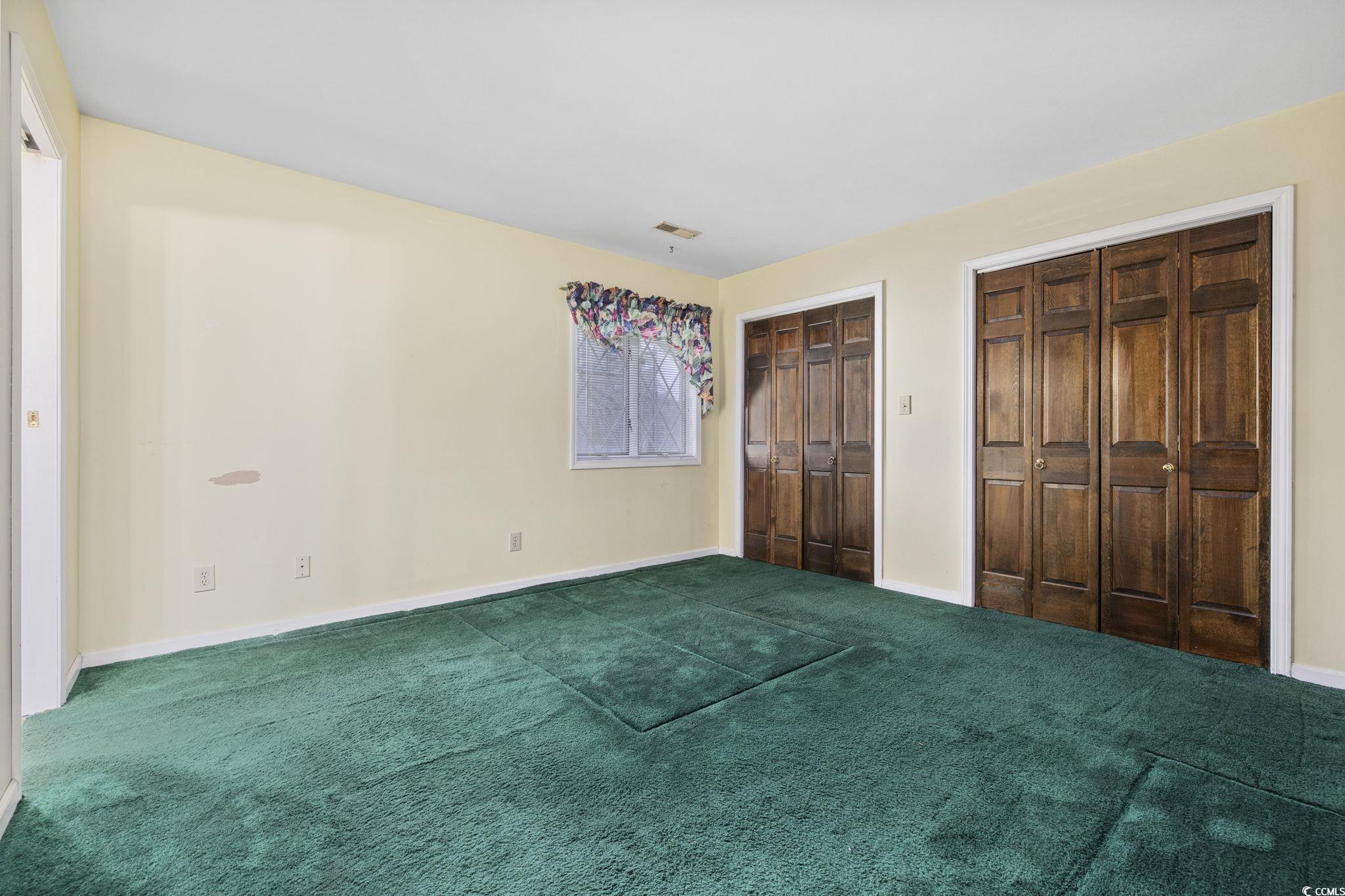1647 Running Water Road Murrells Inlet, SC 29576 - Photo 19 of 39 Unfurnished bedroom featuring carpet floors and tw