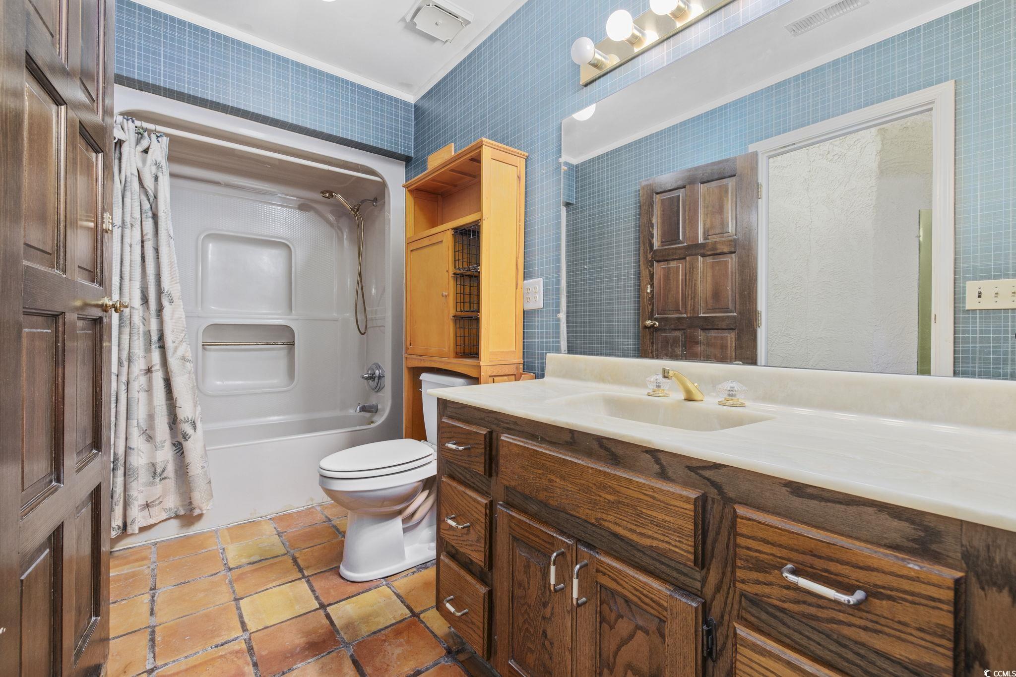 1647 Running Water Road Murrells Inlet, SC 29576 - Photo 20 of 39 Full bathroom featuring tile patterned floors, orn