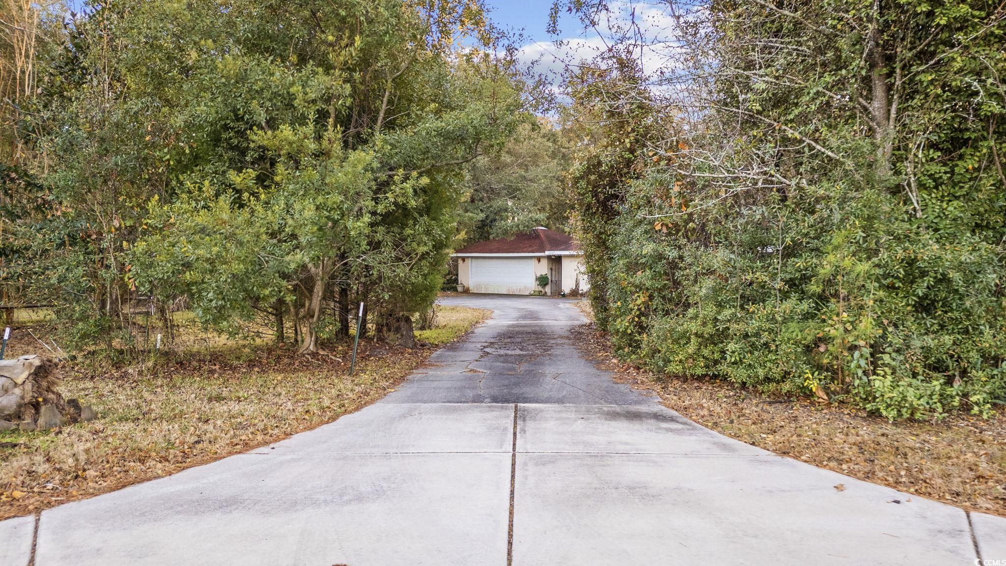 1647 Running Water Road Murrells Inlet, SC 29576 - Photo 2 of 39 Exterior space