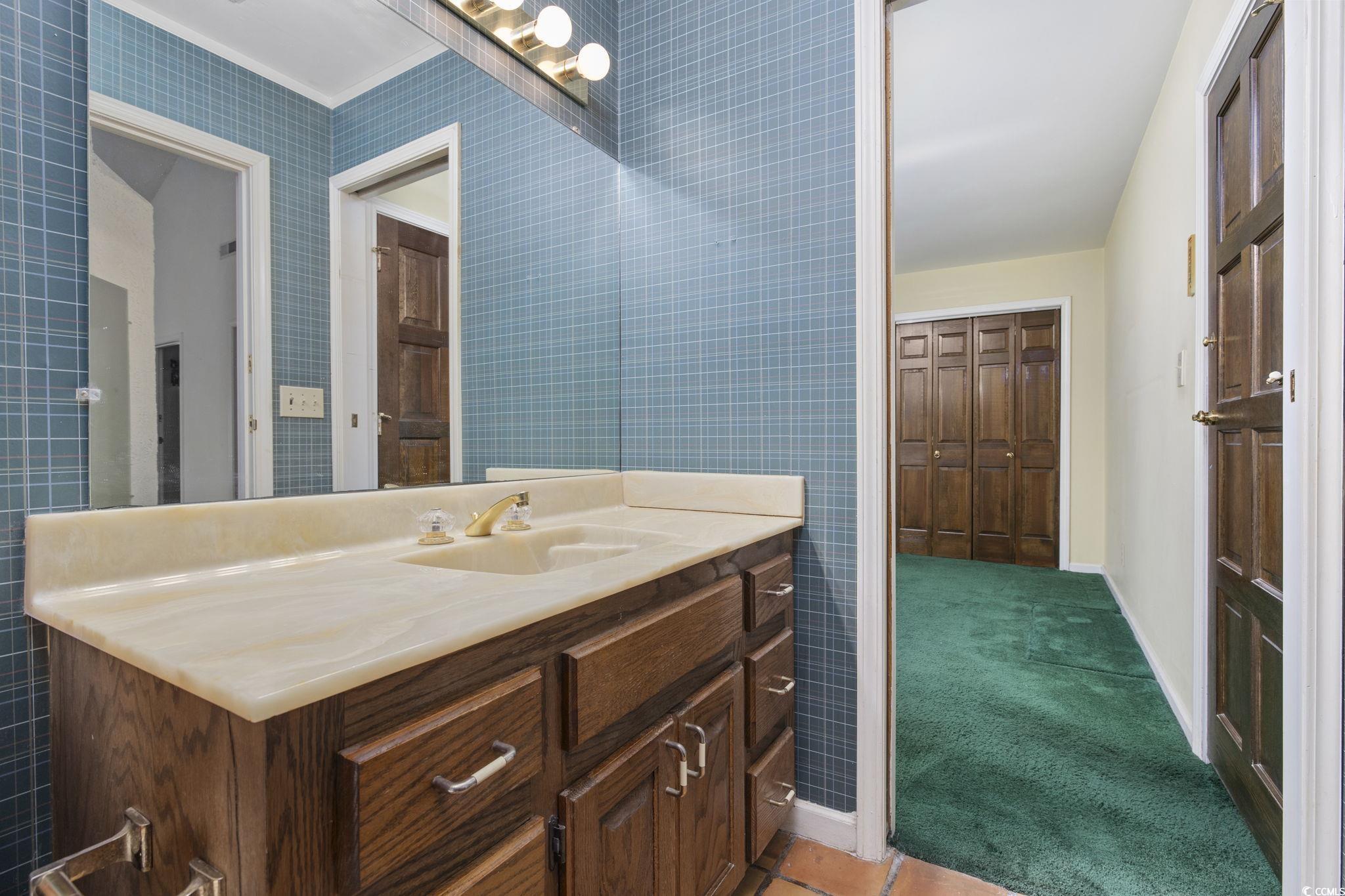 1647 Running Water Road Murrells Inlet, SC 29576 - Photo 21 of 39 Bathroom featuring vanity and tile patterned floor