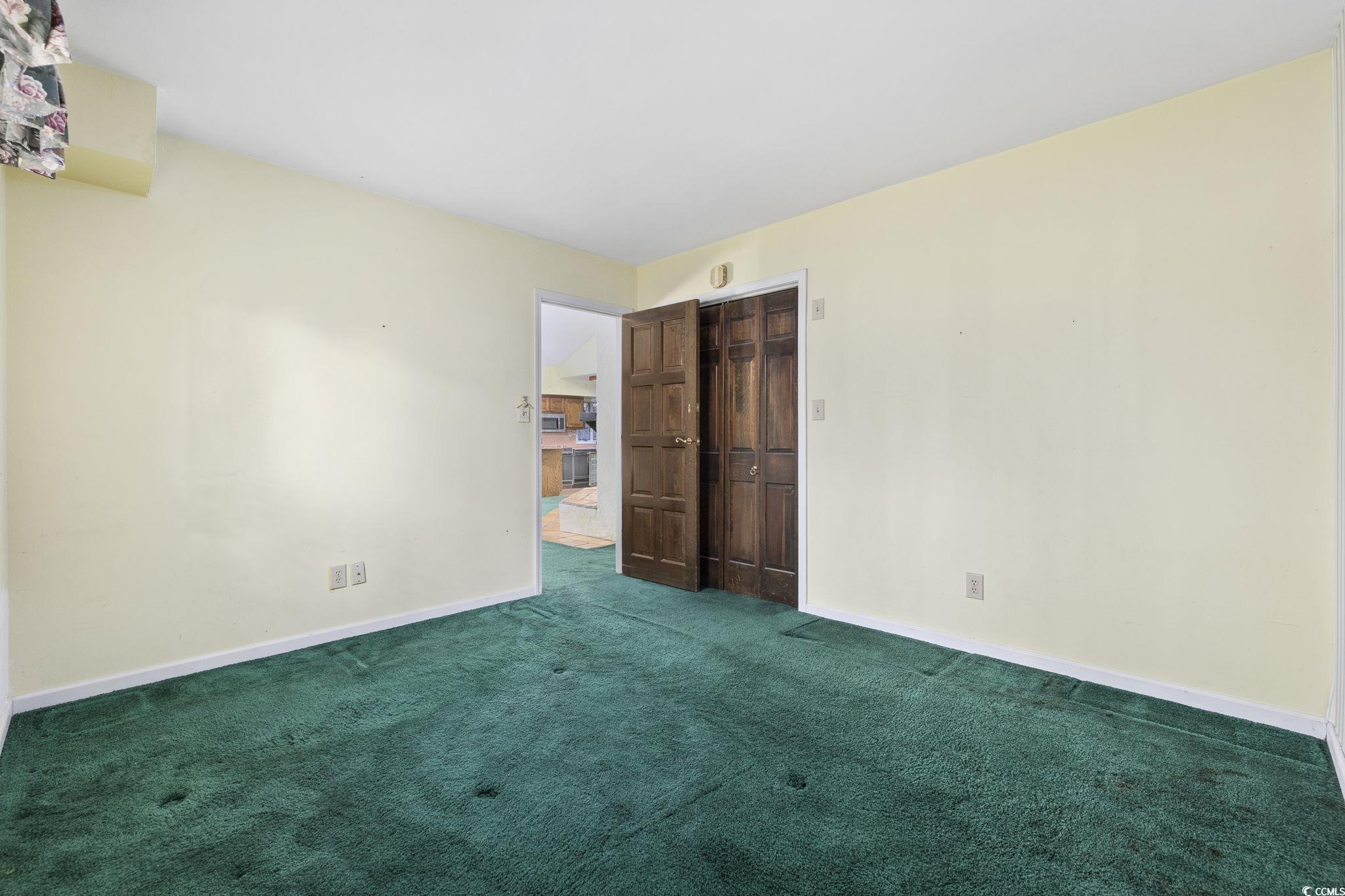 1647 Running Water Road Murrells Inlet, SC 29576 - Photo 25 of 39 Unfurnished bedroom featuring carpet flooring