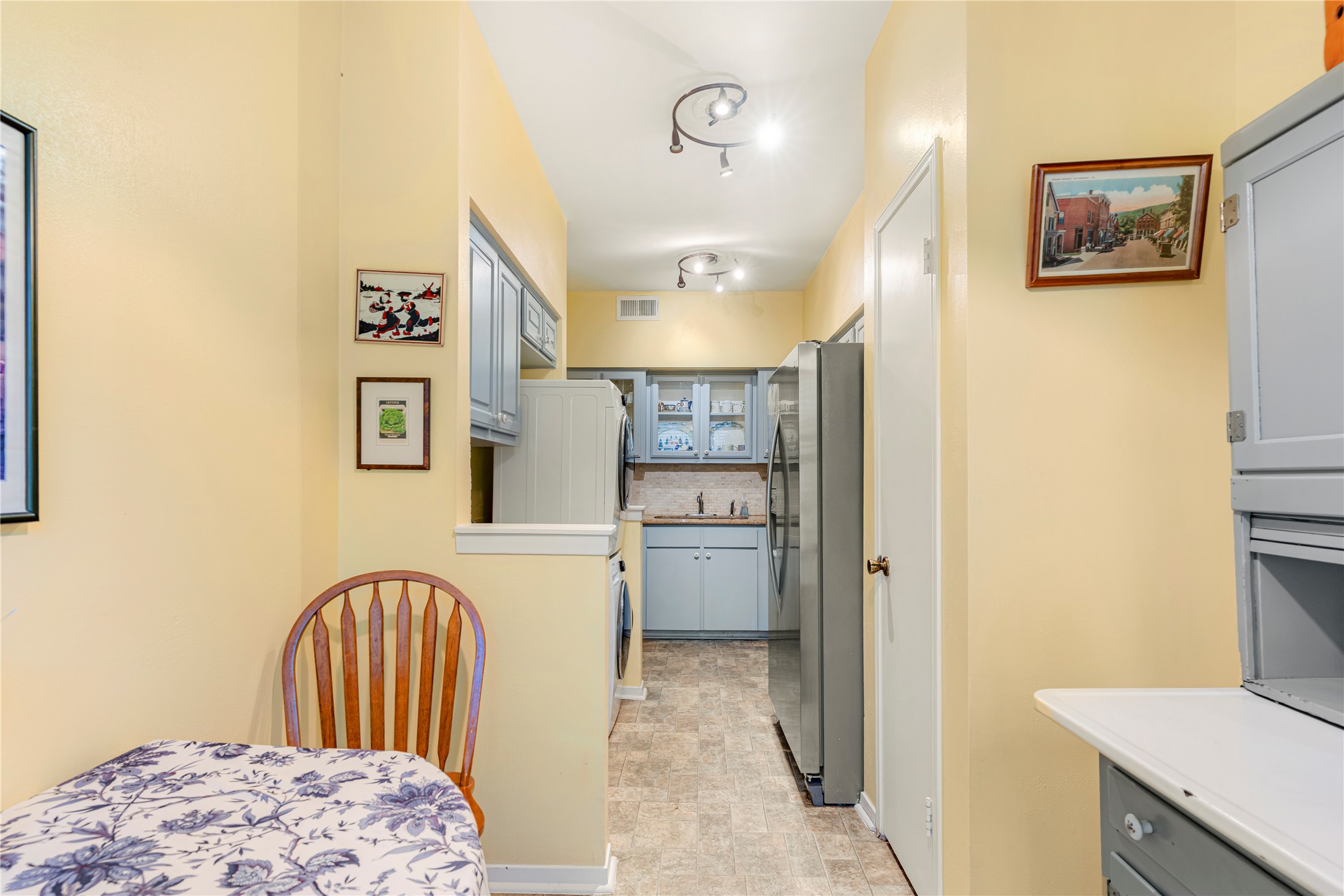 3627 Wakeforest Avenue Houston, TX 77098 - Photo 6 of 22 a kitchen with a refrigerator and a stove