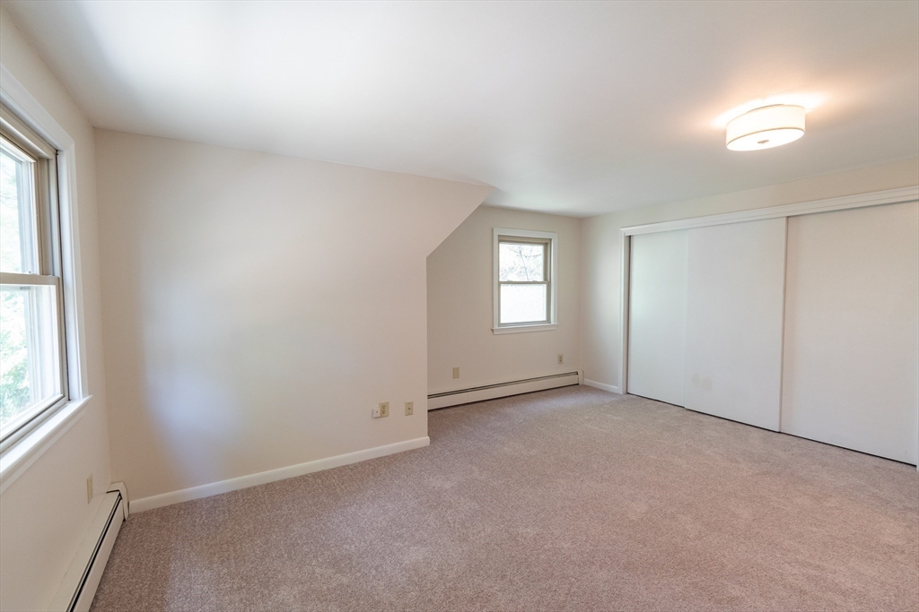 60 Crooked Spring Road North Chelmsford, MA 01863 - Photo 16 of 25 an empty room with windows