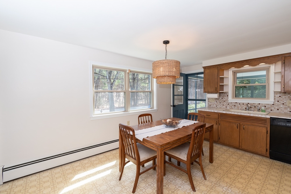 60 Crooked Spring Road North Chelmsford, MA 01863 - Photo 5 of 25 a view of a dining room with furniture window and outside view