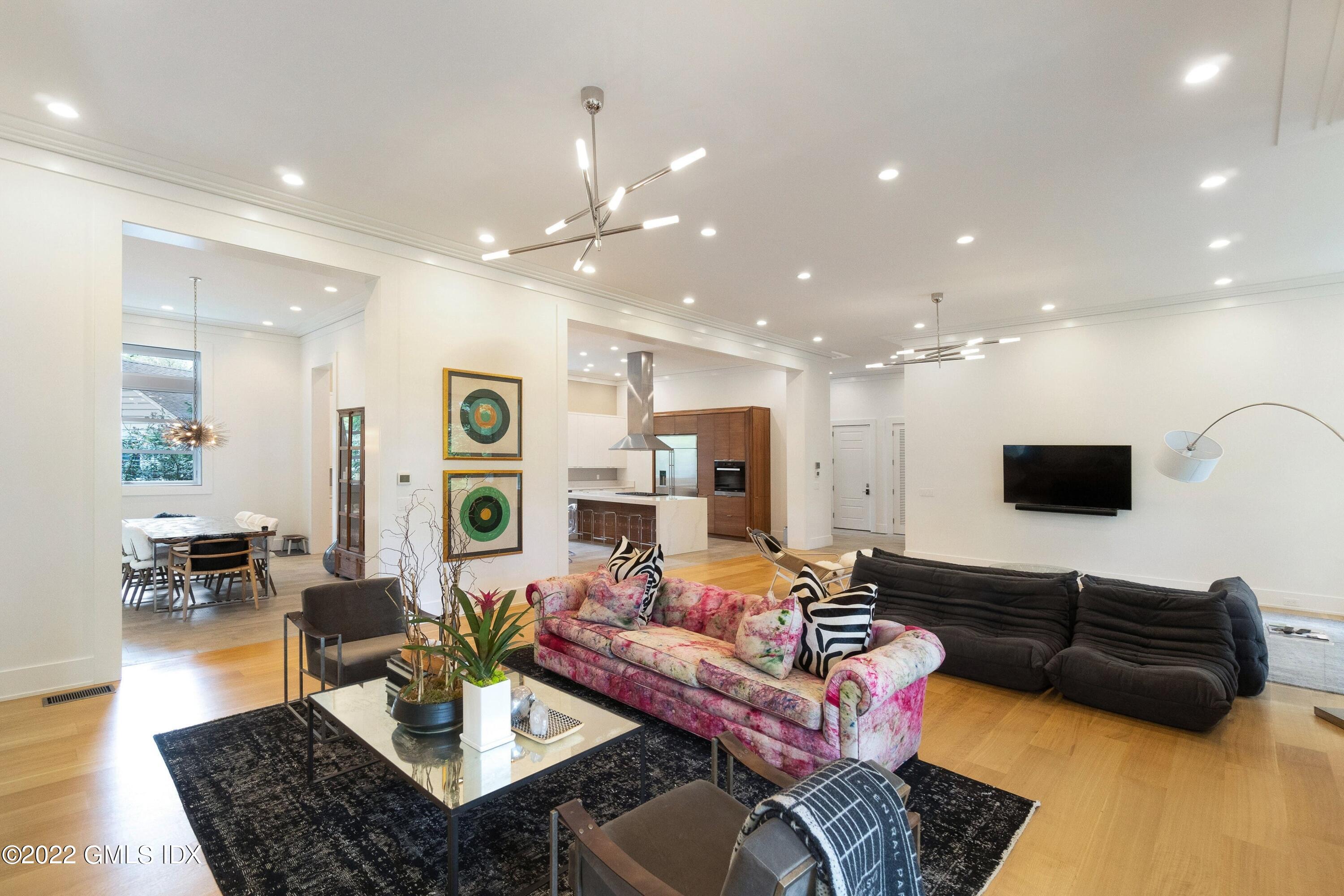 22 Oak Drive Riverside, CT 06878 - Photo 12 of 40 a living room with furniture and a flat screen tv