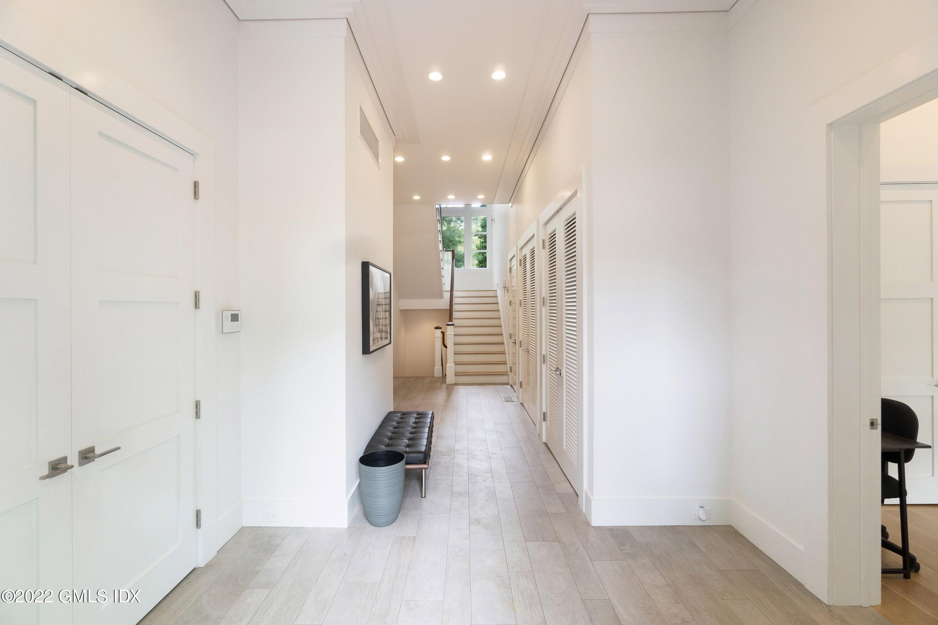 22 Oak Drive Riverside, CT 06878 - Photo 15 of 40 a view of entryway with wooden floor
