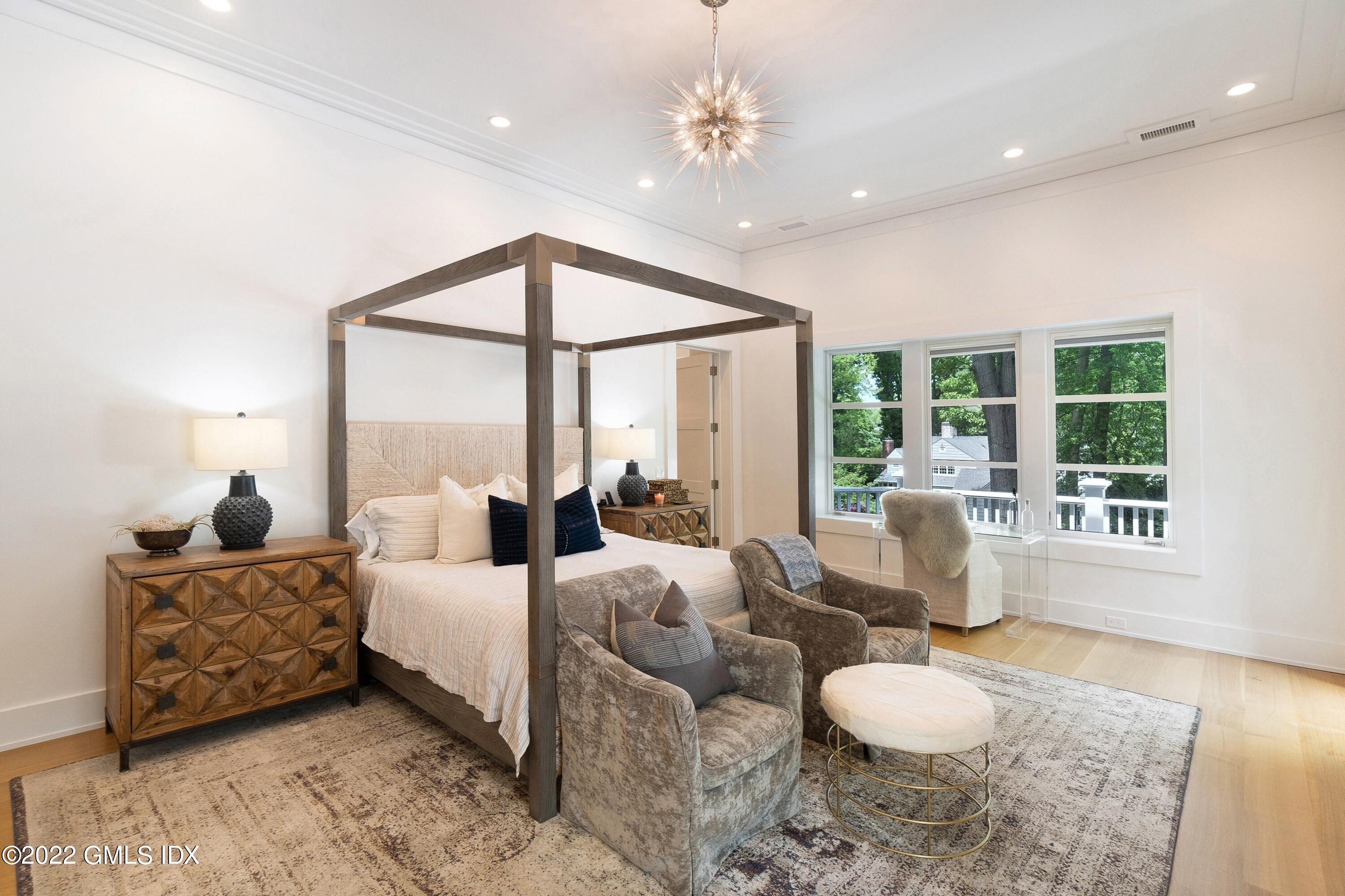 22 Oak Drive Riverside, CT 06878 - Photo 16 of 40 a living room with furniture large window and wooden floor