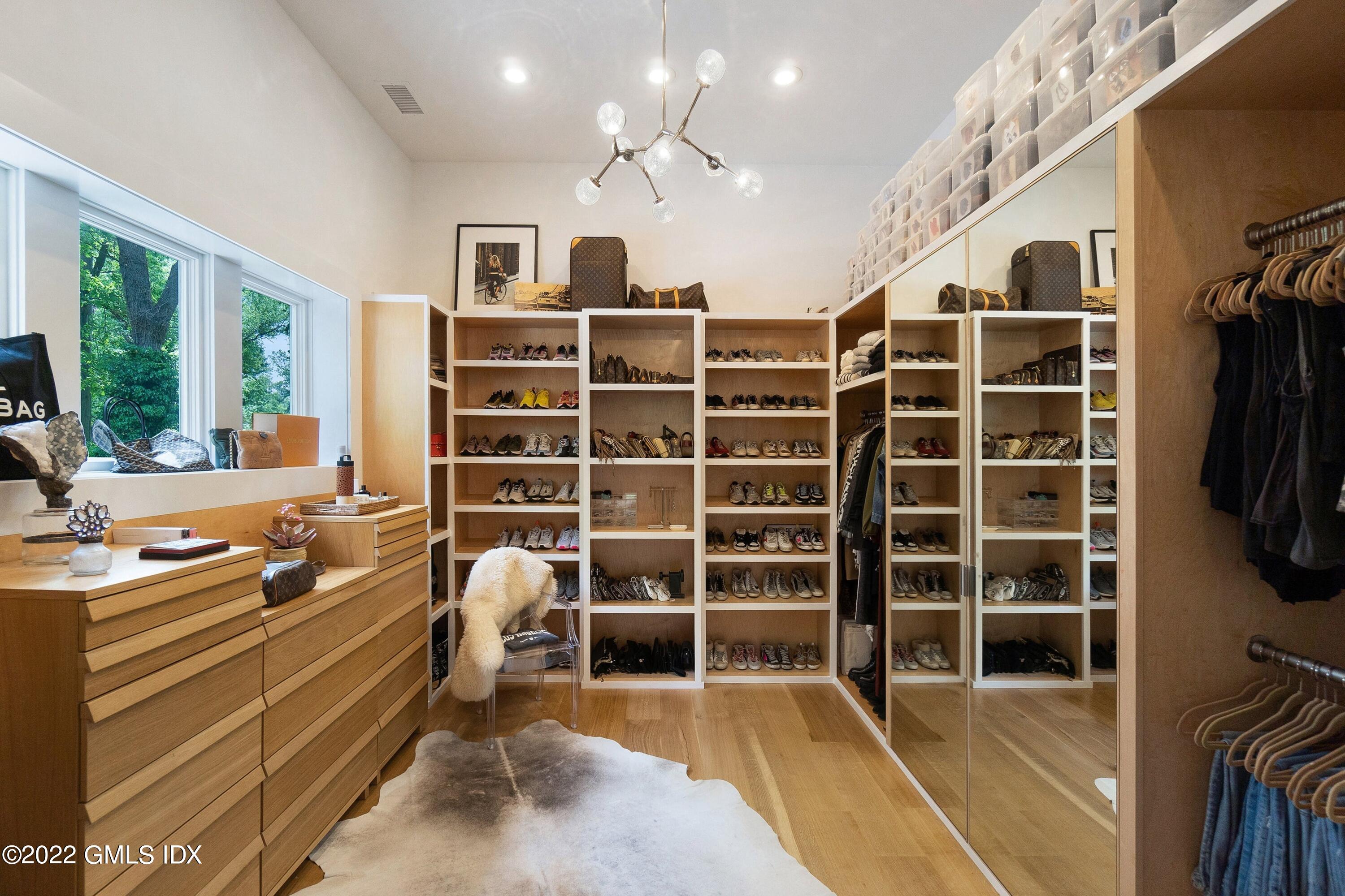 22 Oak Drive Riverside, CT 06878 - Photo 22 of 40 a room with furniture a window and a flat screen tv