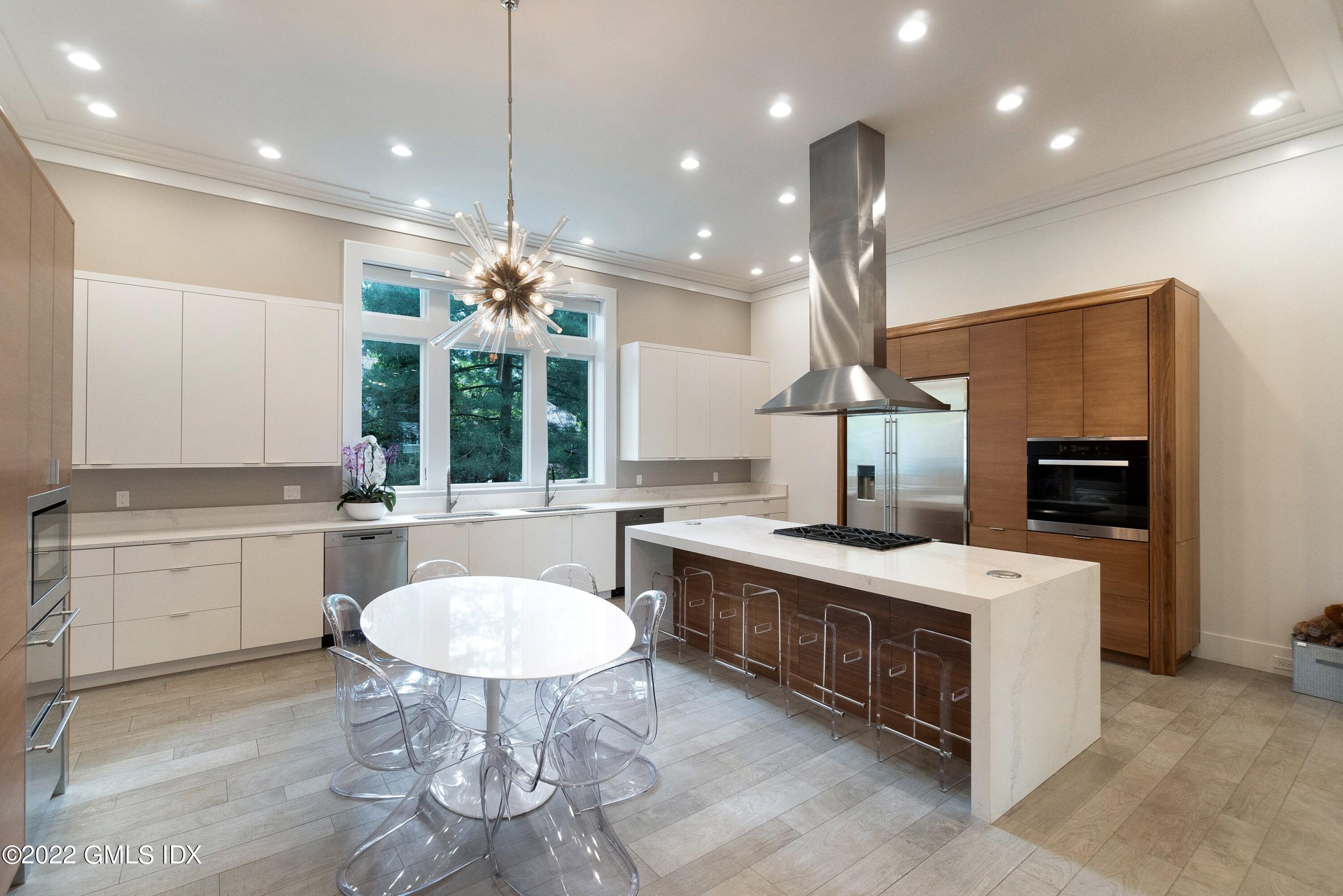 22 Oak Drive Riverside, CT 06878 - Photo 6 of 40 a kitchen with a sink and stove