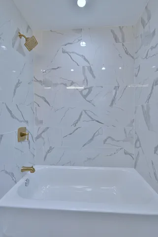 a bathroom with a bathtub
