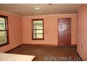 108 Branch Street Rutherfordton, NC 28139 - Photo 4 of 9 an empty room with windows
