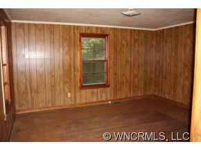 108 Branch Street Rutherfordton, NC 28139 - Photo 8 of 9 a view of an empty room with a window