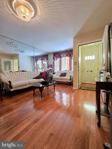 a bathroom with a toilet and a mirror