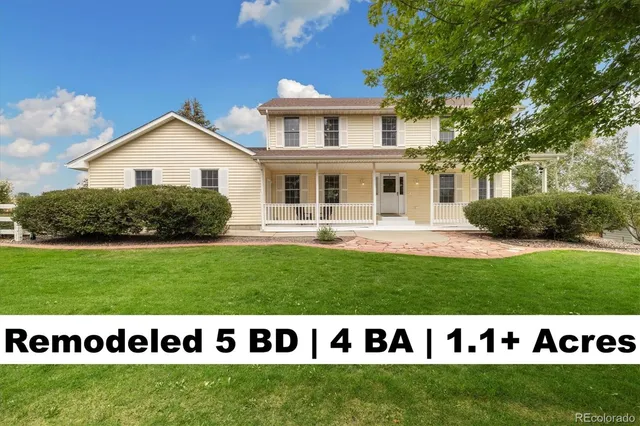 a view of a house with a big yard