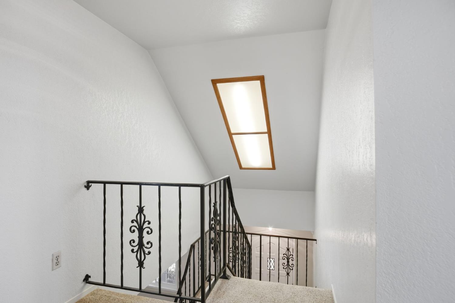 16166 Lawrence Road Escalon, CA 95320 - Photo 25 of 56 a view of staircase with railing and a window