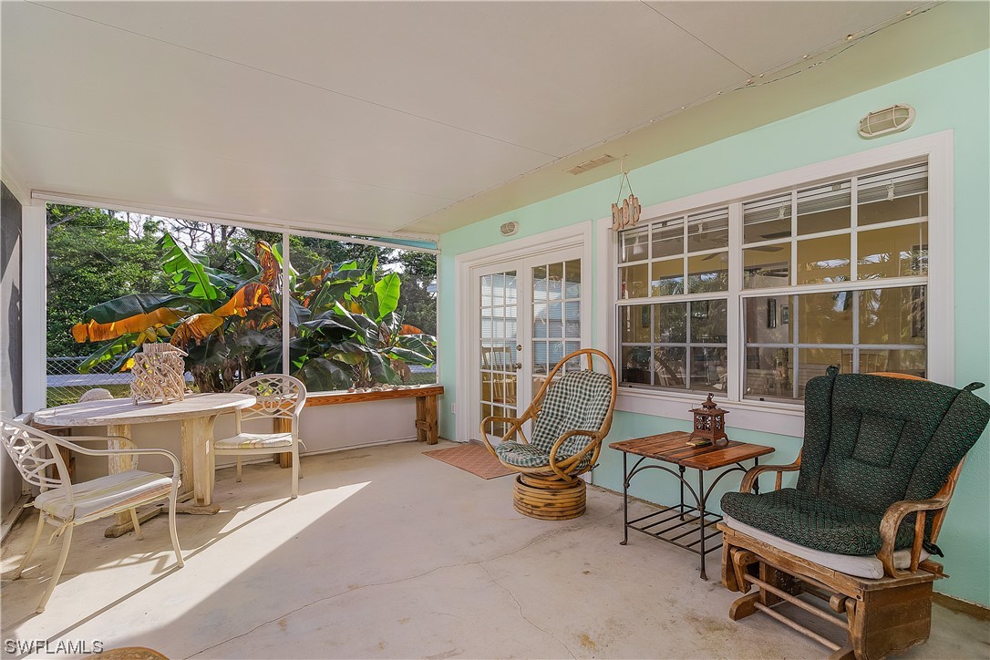 5776 Tarpon Road Bokeelia, FL 33922 - Photo 27 of 31 a view of a lounge chairs in the patio