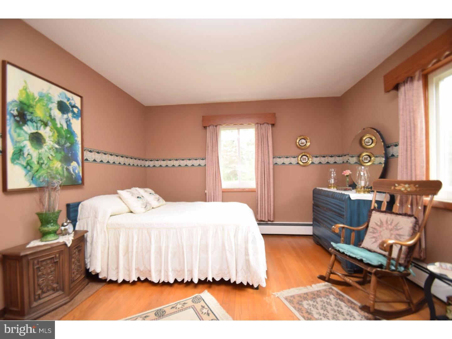 2564 Welshtown Road Slatington, PA 18080 - Photo 14 of 25 a bedroom with a bed and wooden floor