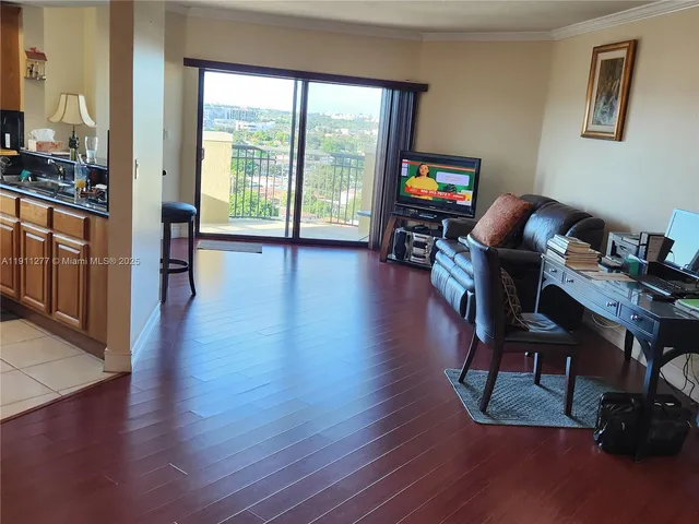 a workspace with furniture hardwood and a window