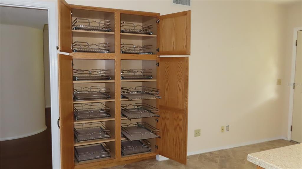 2291 Americus Boulevard West, Unit 7 Clearwater, FL 33763 - Photo 21 of 57 a view of a room with walk in closet and window
