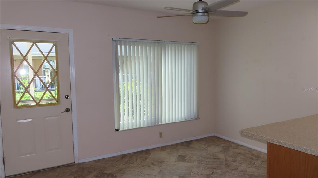 2291 Americus Boulevard West, Unit 7 Clearwater, FL 33763 - Photo 24 of 57 an empty room that has a window