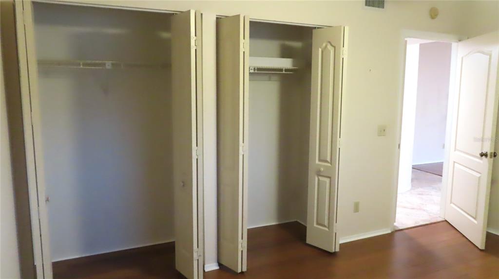 2291 Americus Boulevard West, Unit 7 Clearwater, FL 33763 - Photo 38 of 57 a view of a hallway with wooden floor