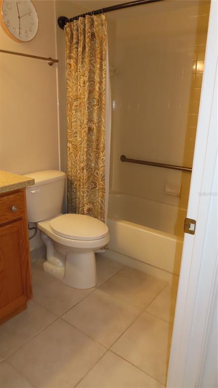 2291 Americus Boulevard West, Unit 7 Clearwater, FL 33763 - Photo 43 of 57 a bathroom with a toilet and shower