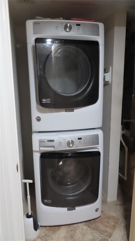 2291 Americus Boulevard West, Unit 7 Clearwater, FL 33763 - Photo 47 of 57 a utility room with washing machine