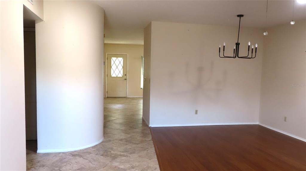 2291 Americus Boulevard West, Unit 7 Clearwater, FL 33763 - Photo 8 of 57 a view of a room with rack on the wall