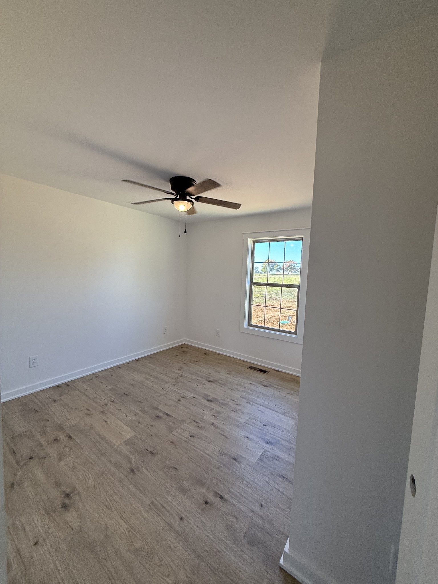 4827 Akersville Road Lafayette, TN 37083 - Photo 13 of 14 wooden floor in an empty room