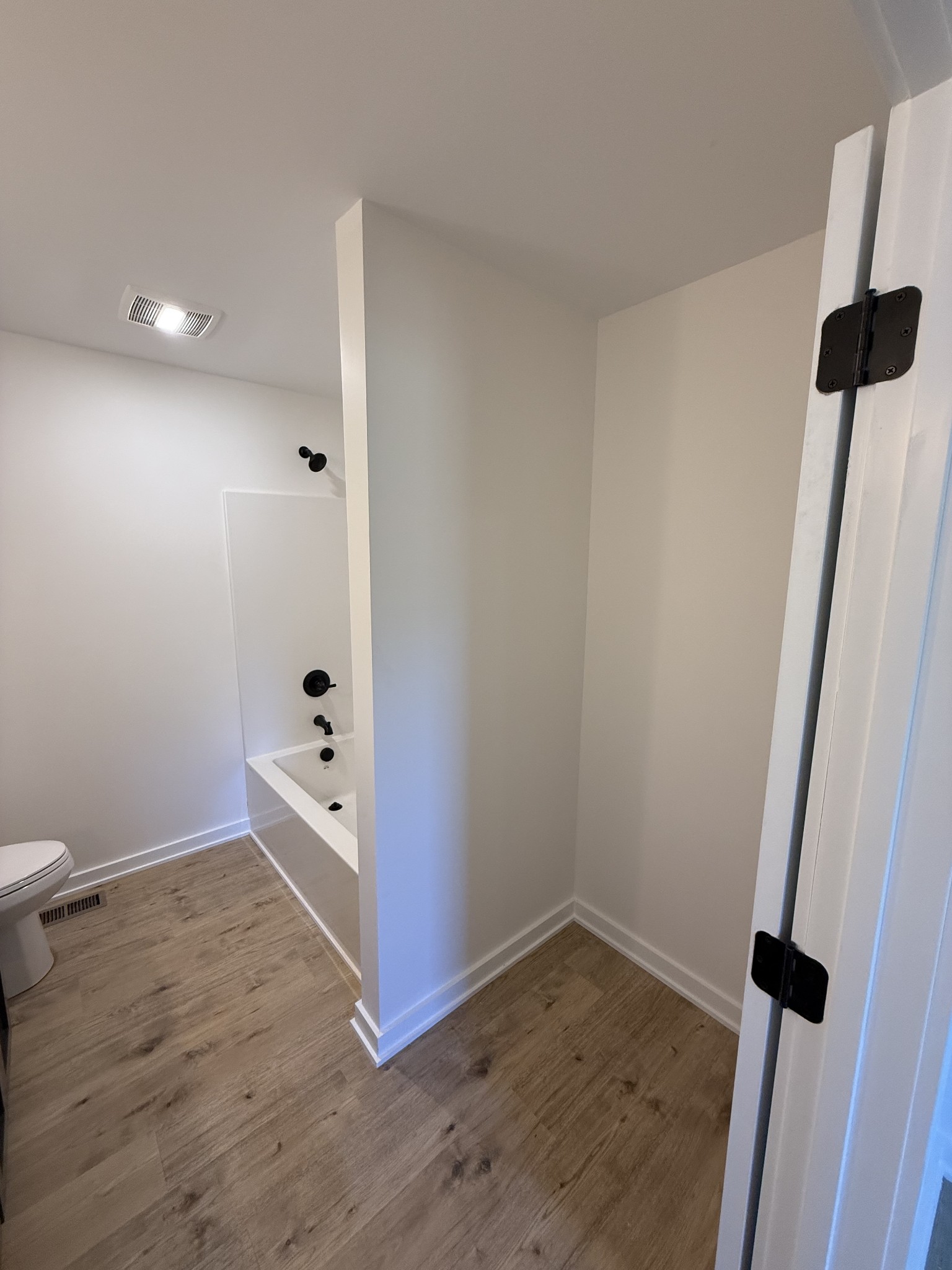 4827 Akersville Road Lafayette, TN 37083 - Photo 7 of 14 wooden floor in an empty room