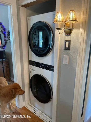 a close view of a utility room with washer and dryer