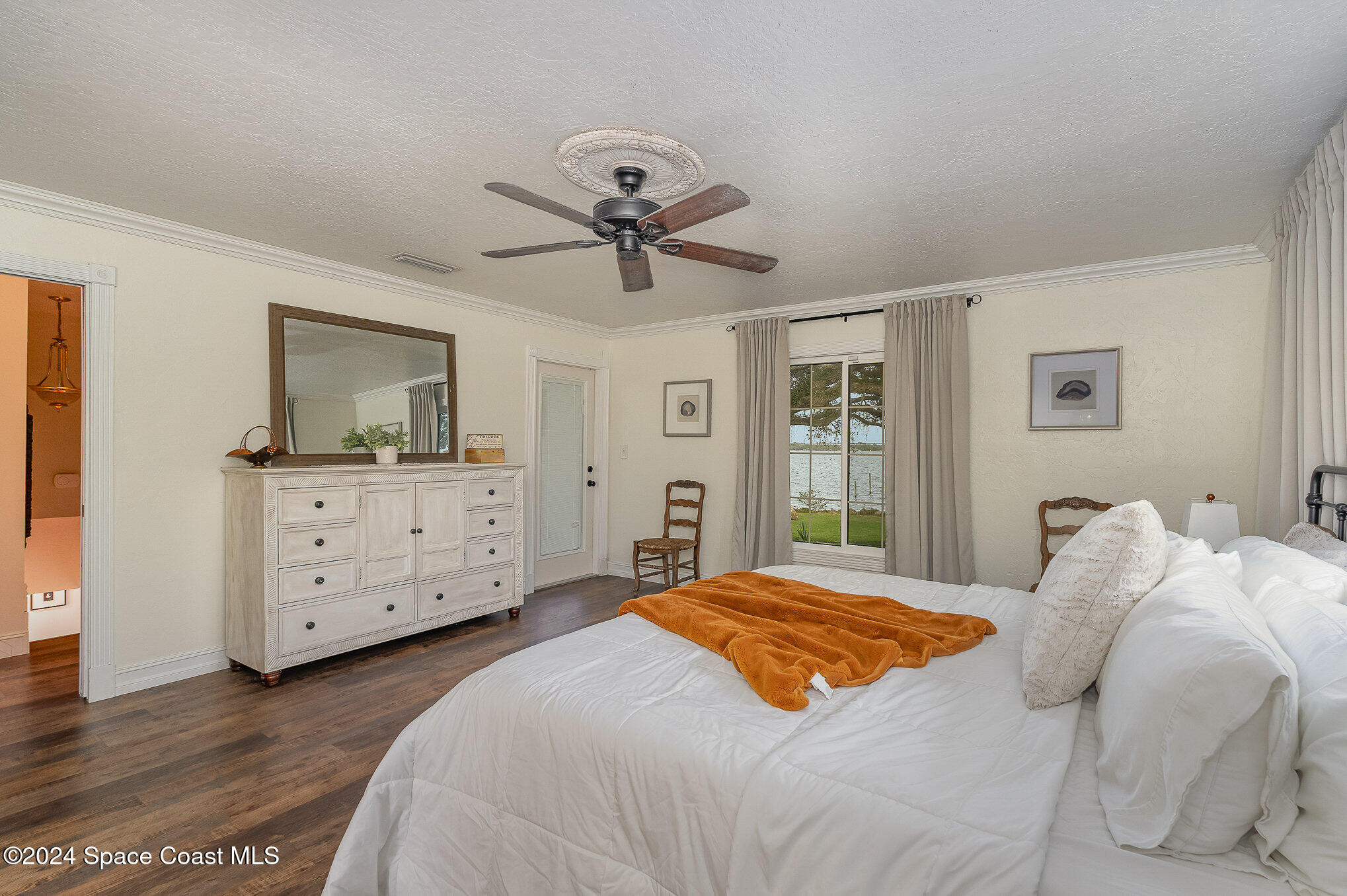 2175 Rockledge Drive Rockledge, FL 32955 - Photo 23 of 48 a bedroom with a bed and a window