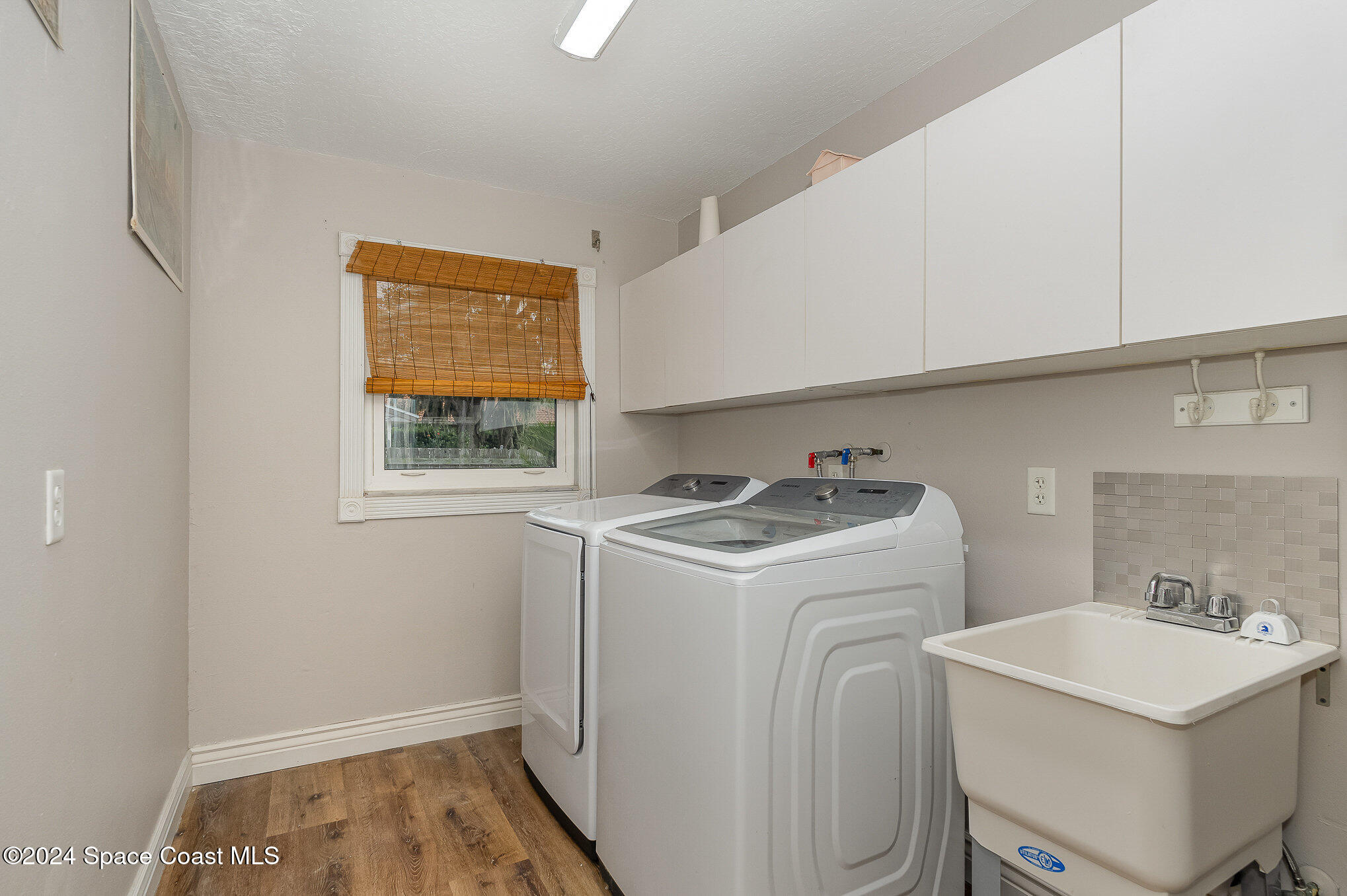 2175 Rockledge Drive Rockledge, FL 32955 - Photo 30 of 48 a utility room with dryer and washer