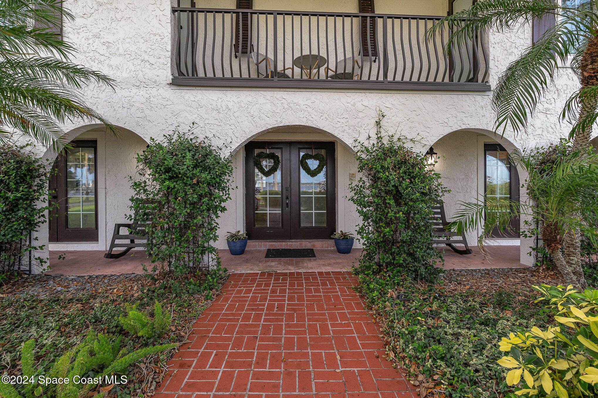 2175 Rockledge Drive Rockledge, FL 32955 - Photo 3 of 48 a front view of a house with plants