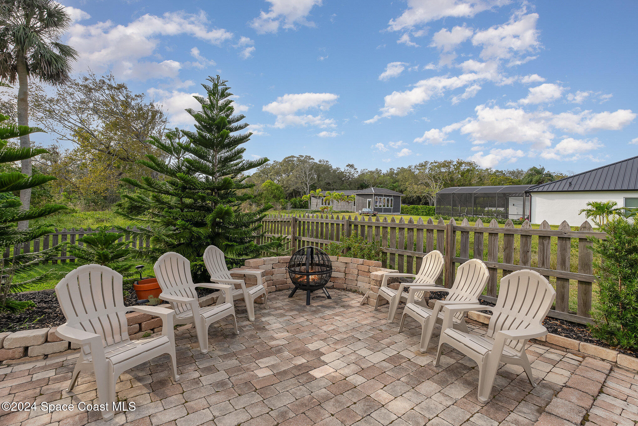 2175 Rockledge Drive Rockledge, FL 32955 - Photo 34 of 48 a view of a chair and table on the terrace