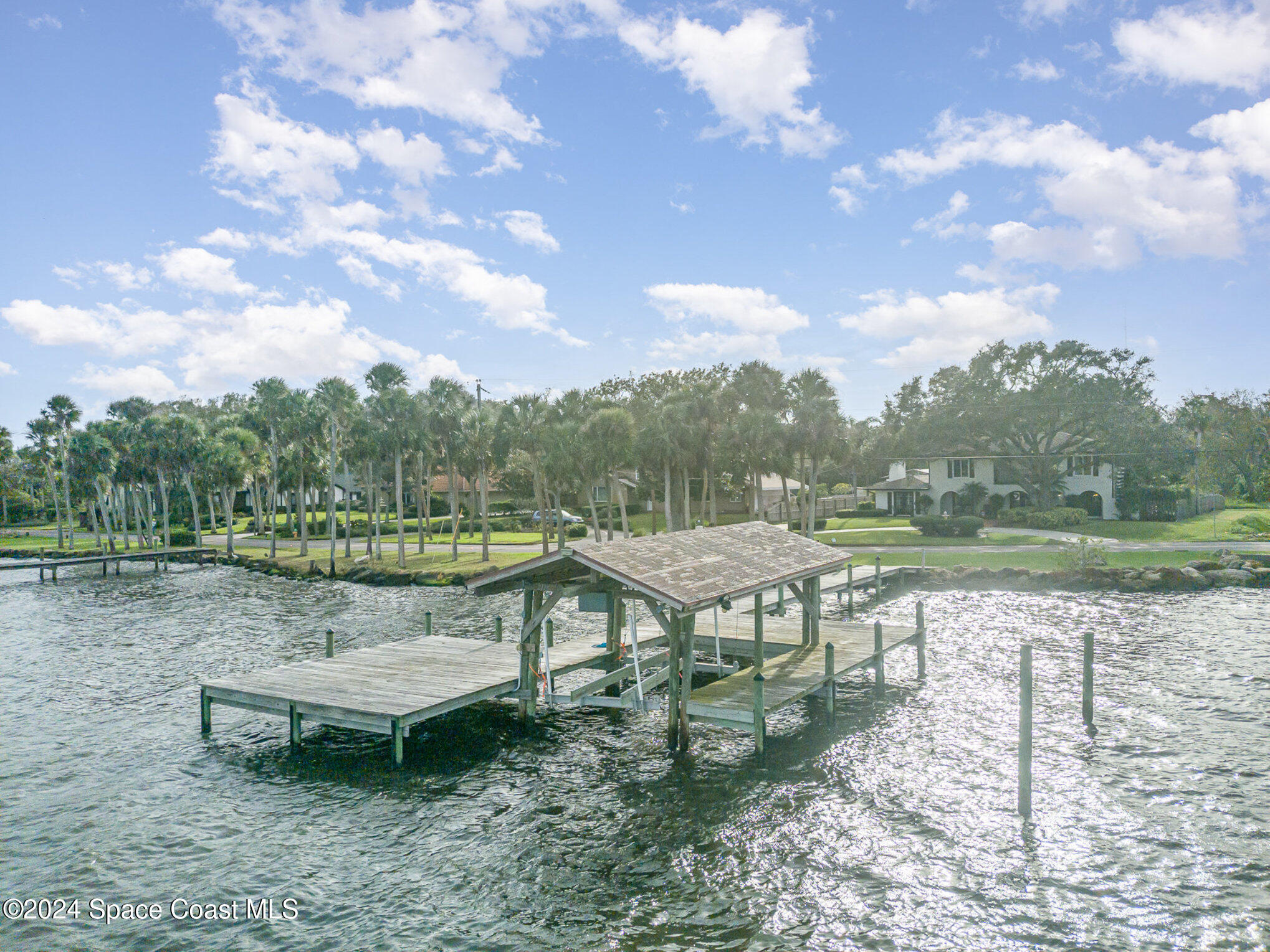 2175 Rockledge Drive Rockledge, FL 32955 - Photo 39 of 48 a view of a lake with a yard