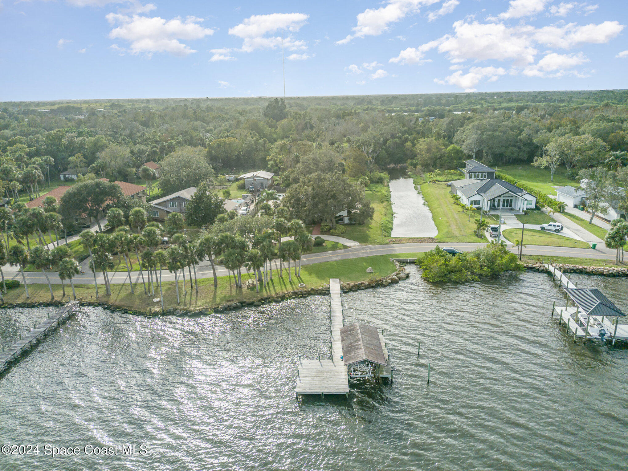 2175 Rockledge Drive Rockledge, FL 32955 - Photo 42 of 48 an aerial view of a house with a yard
