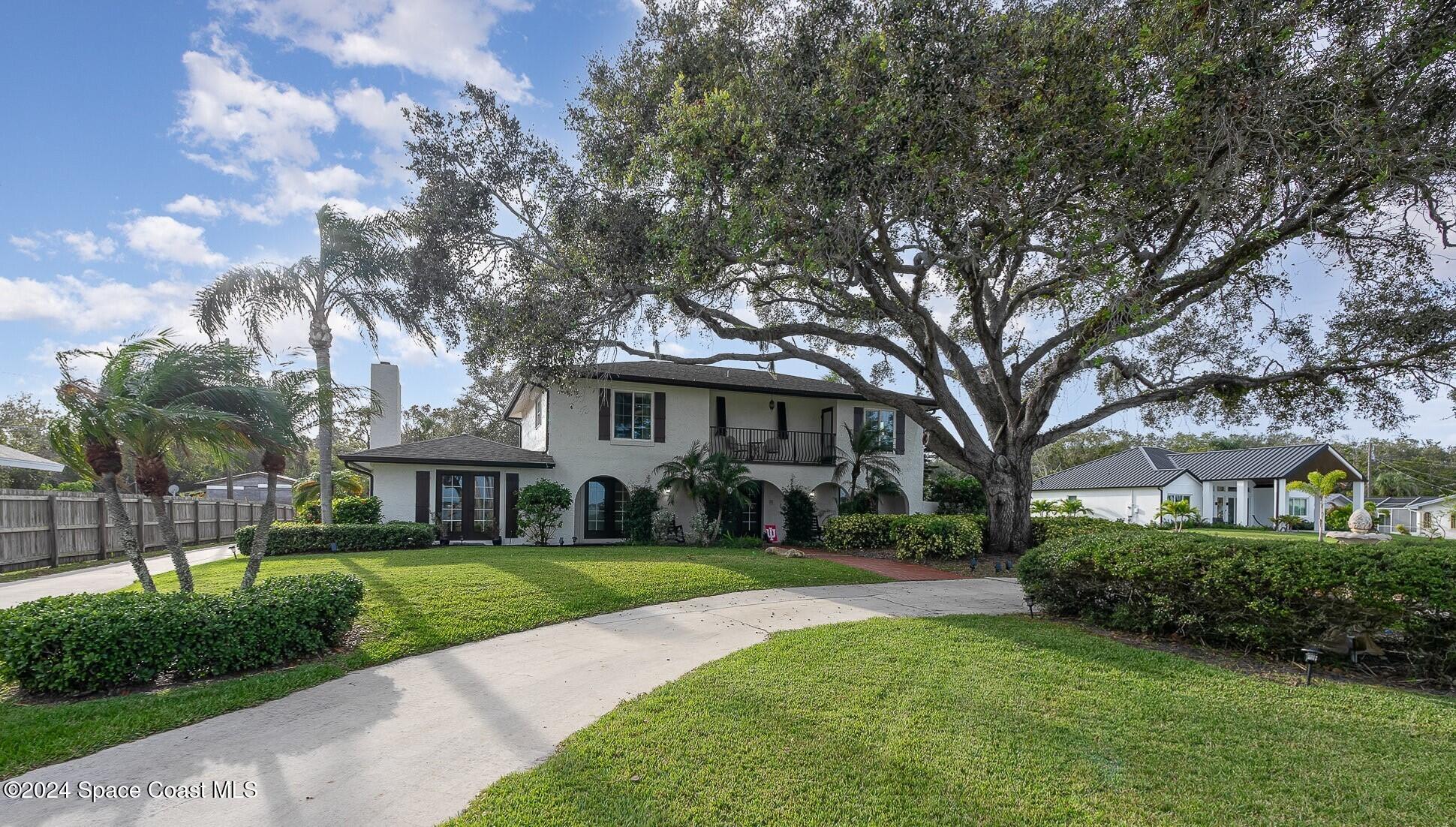 2175 Rockledge Drive Rockledge, FL 32955 - Photo 48 of 48 a front view of a house with a yard
